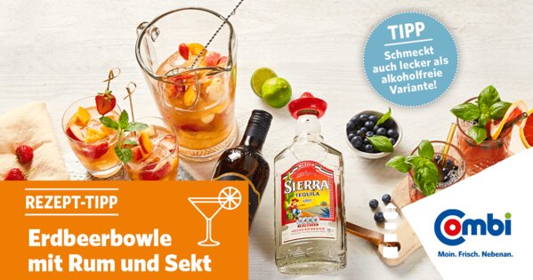 Weißer Tisch mit Tequila, Erdbeere, Heidelbeeren, Cocktails und einem Pincher