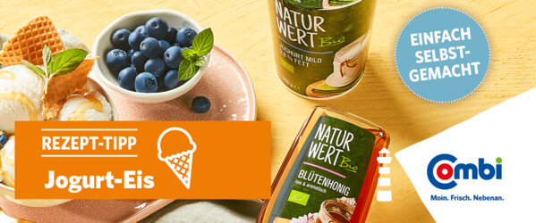 Gelber Tisch mit Jogurt-Eis und einer Schale Heidelbeeren dazu Naturwert Bio Jogurt und Blütenhonig