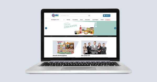 Laptop der de Click & Collect Online-Shop anzeigt